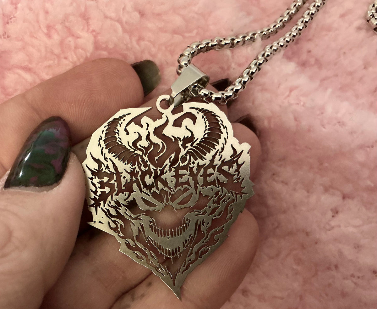 Black Eyes skull custom cut steel charm and chain