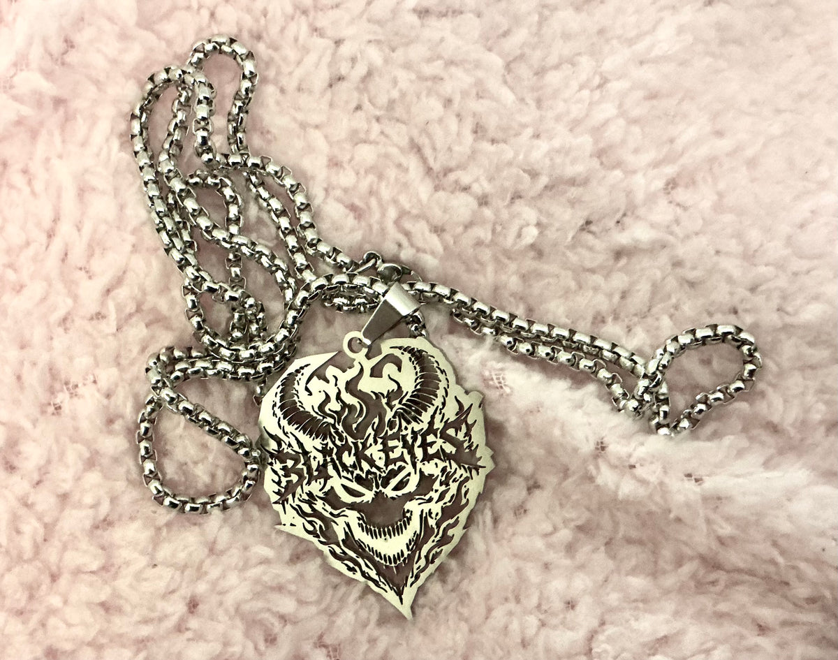 Black Eyes skull custom cut steel charm and chain